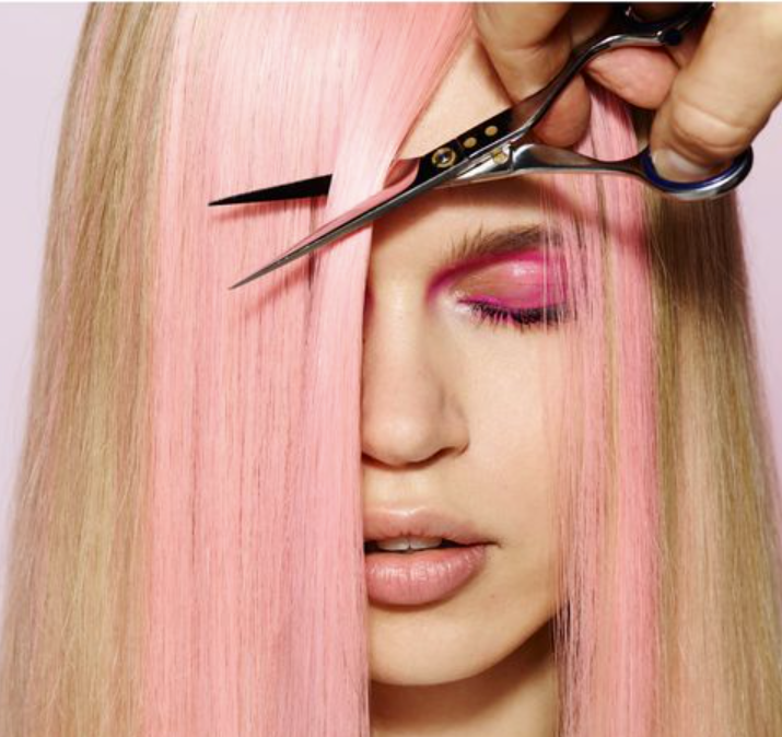 Cover of Cosmopolitan magazine with Image of girl getting hair cut.