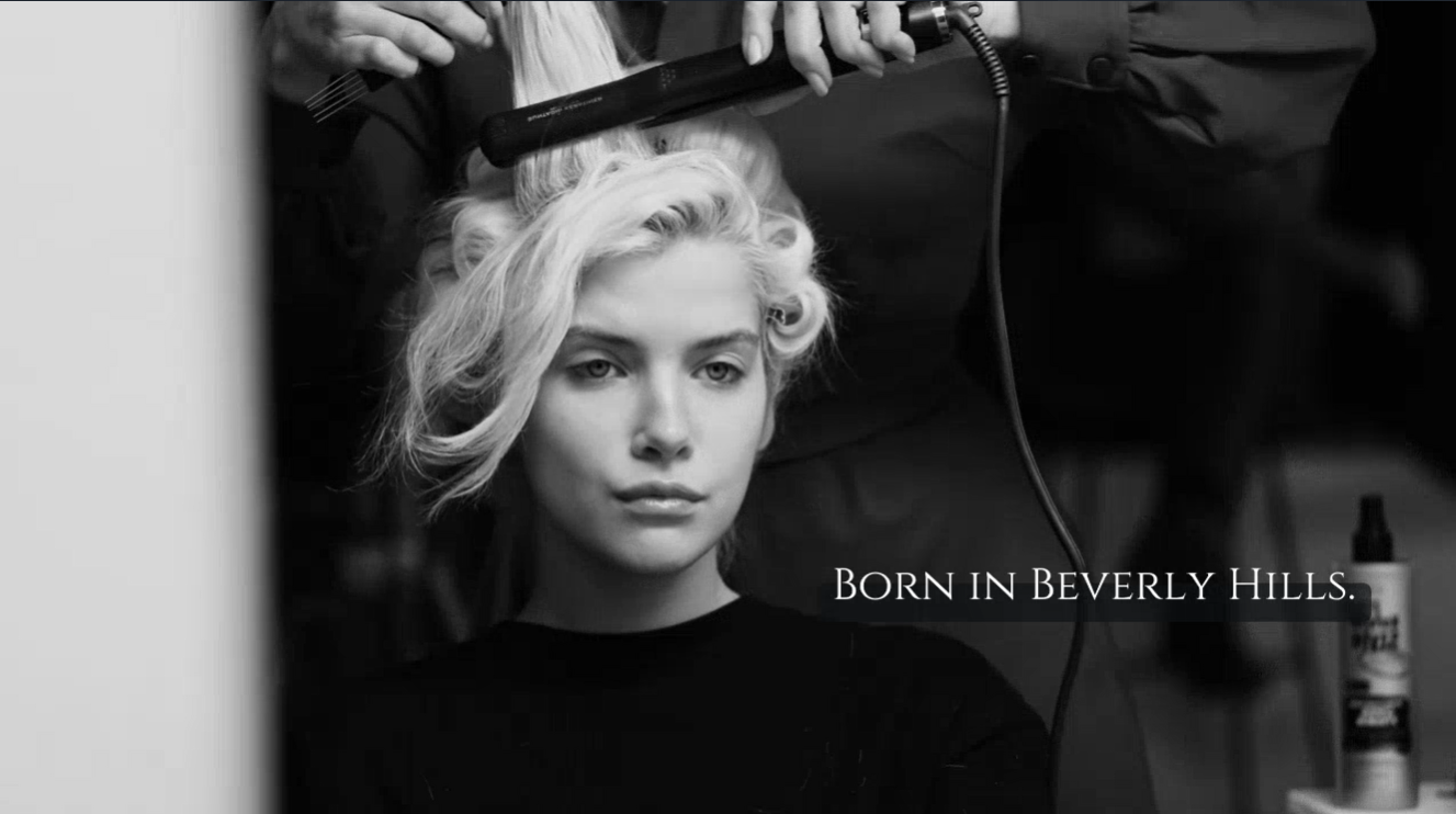 Girl that looks like Marilyn Monroe at a hair salon the captions says, Born in Beverly Hills.
