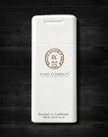 Travel-size conditioner bottle with a white label, displaying the brand Rare Elements and the product name Essential Lite Conditioner.